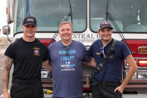 Image of Craig Carlson with two Bell County firefighters