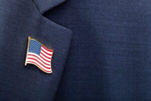 Image of suit lapel with flag pin