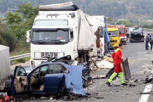 Image of large truck vs car accident