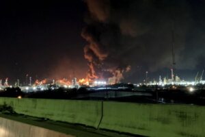 Image of an oil refinery on fire