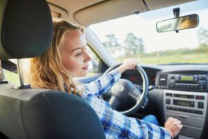 Image of woman driving a car