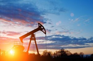 Image of oil rig at sunset