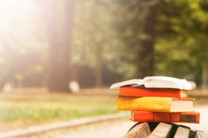 Image of a stack of books on bench