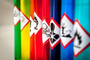 Image of colorful bottles of hazardous materials