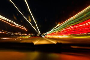 Image with our of focus lights on a street at night