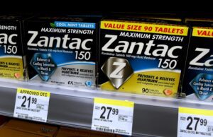 Image of various Zantac products on a store shelf