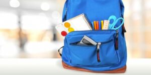 Image of backpack with school supplies inside