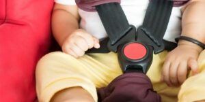 Image of infant buckled in car seat