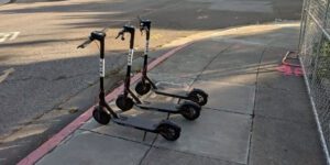 Image of dockless scooters on a sidewalk