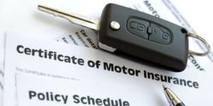 Image with motor insurance documents and car key