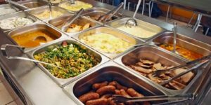 Image of food buffet with various BBQ food items