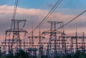 Image of high voltage power lines at sunset