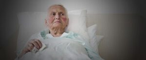 Image of elderly person in bed