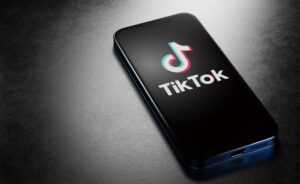 Image of cell phone with Tiktok logo displayed