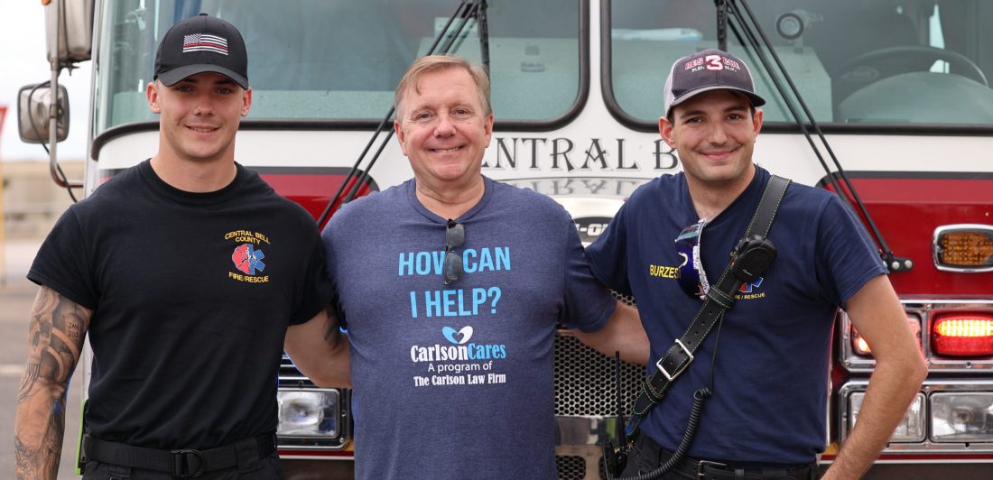 Image of Craig Carlson with two Bell County firefighters