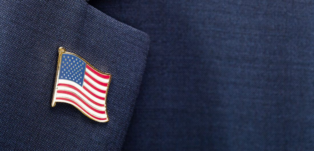 Image of suit lapel with flag pin