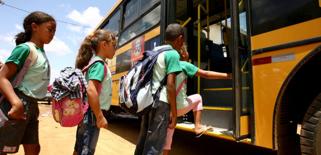 Image of children boarding a school bus