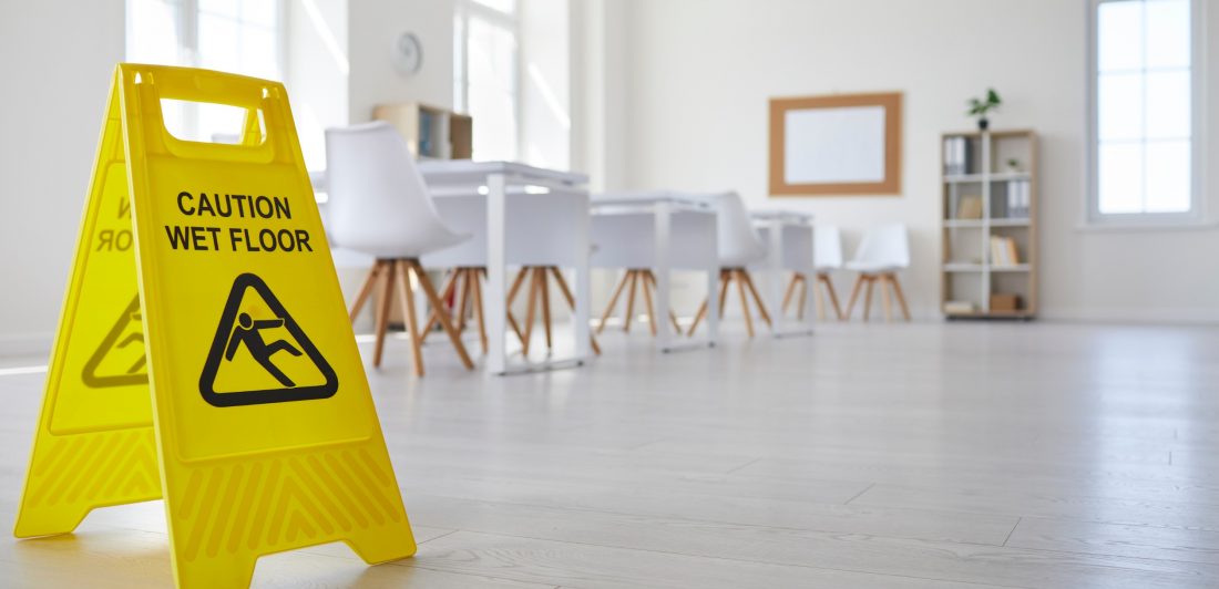 Image of facility with Caution Wet Floor Sign