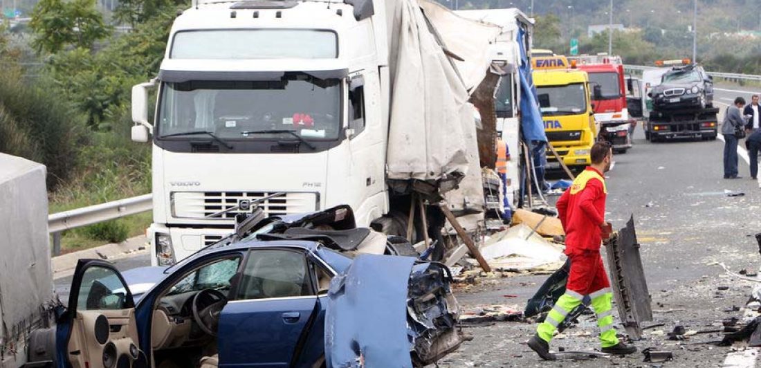 Image of large truck vs car accident