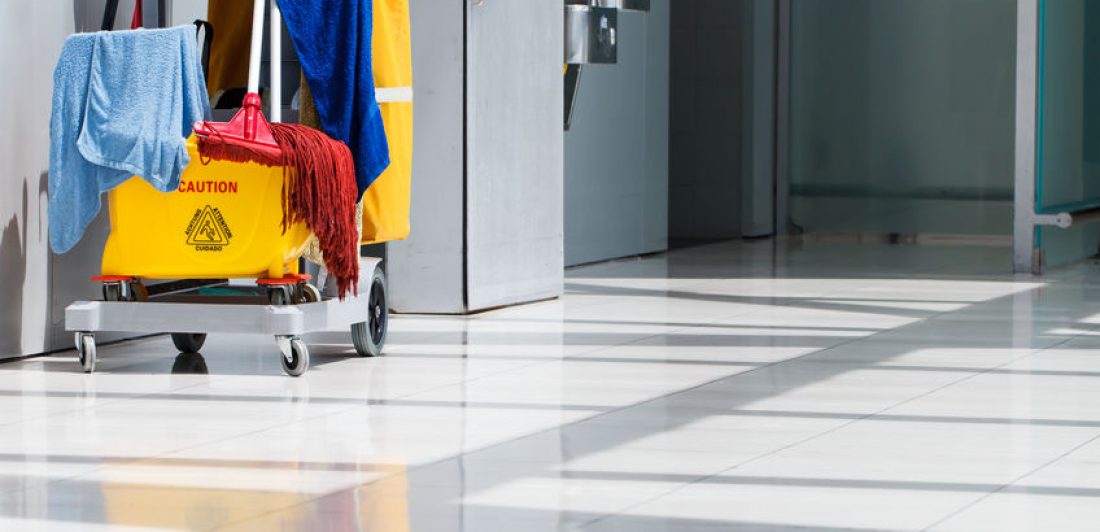 Image of janitor cart on a tile floor