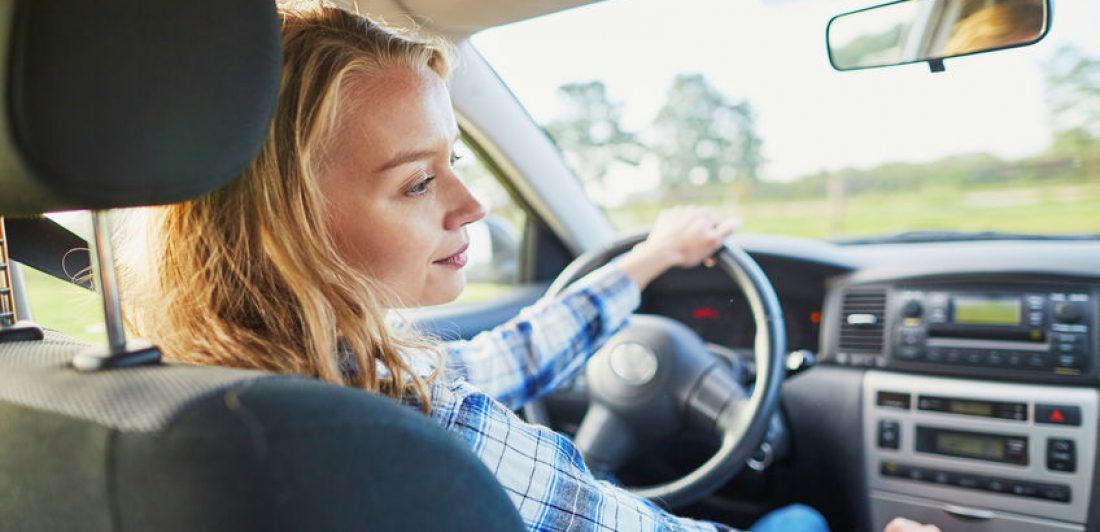 Image of woman driving a car