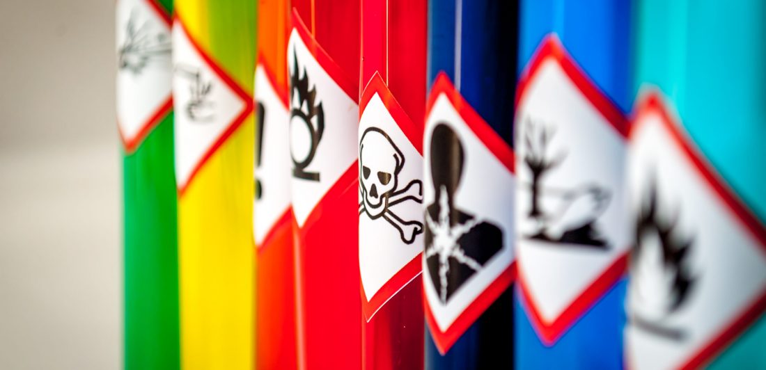 Image of colorful bottles of hazardous materials