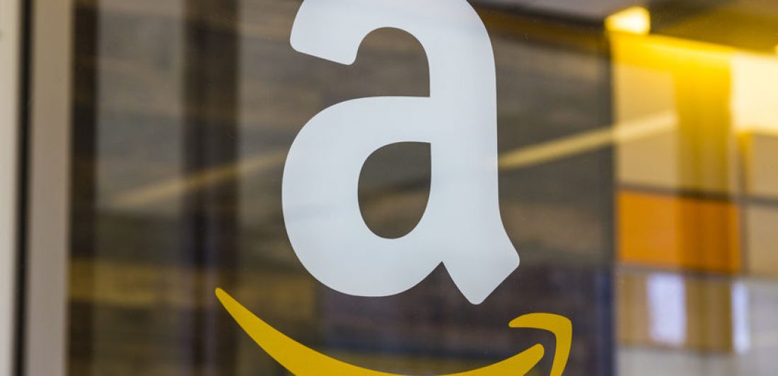 Image of an Amazon store window with the Amazon logo