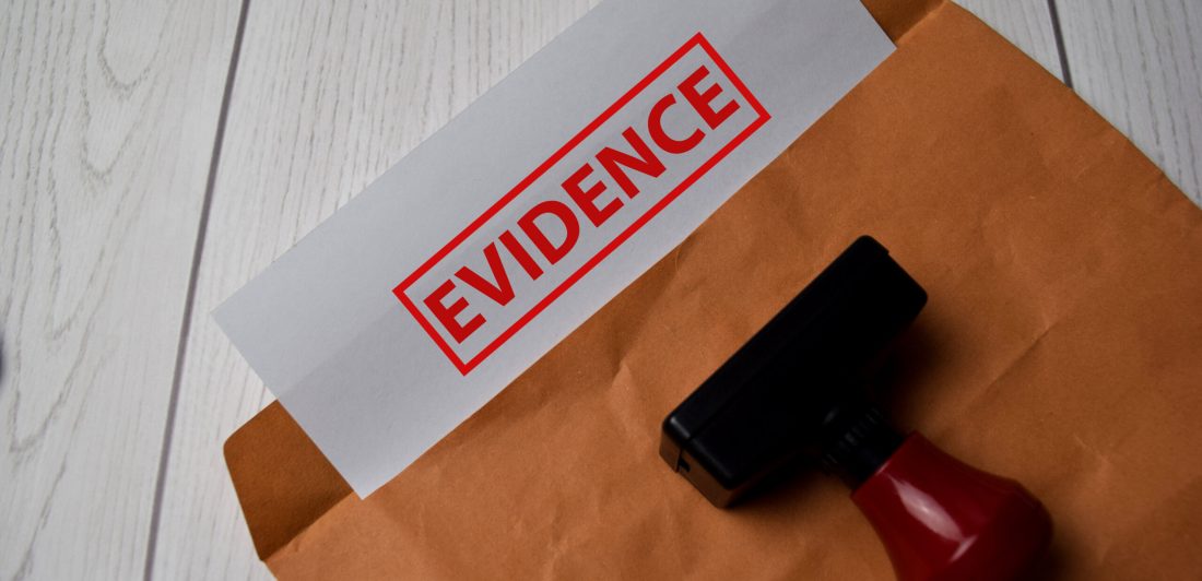 Image of envelop and evidence stamp