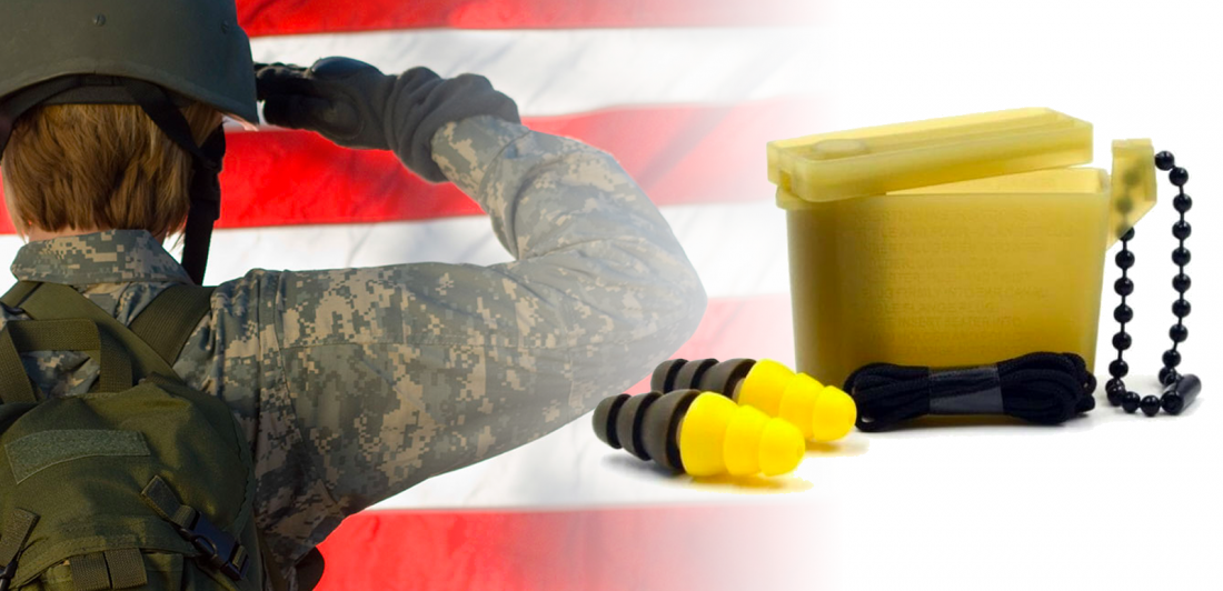 Image of military person with an american flag and ear plugs