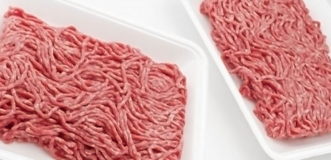 Image of open styrofoam trays containing ground beef