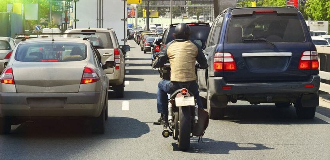 Image of motorcycle driving in traffic