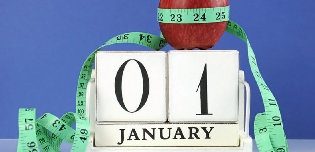 Image of a calendar indicating January 1st, with an apple, and a measuring tape