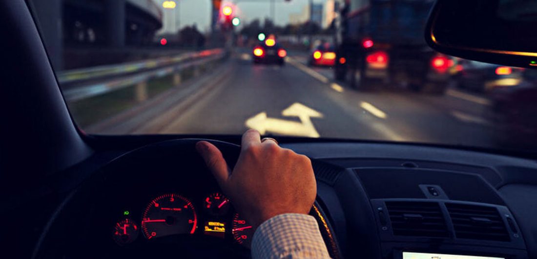 Image of man driving a car