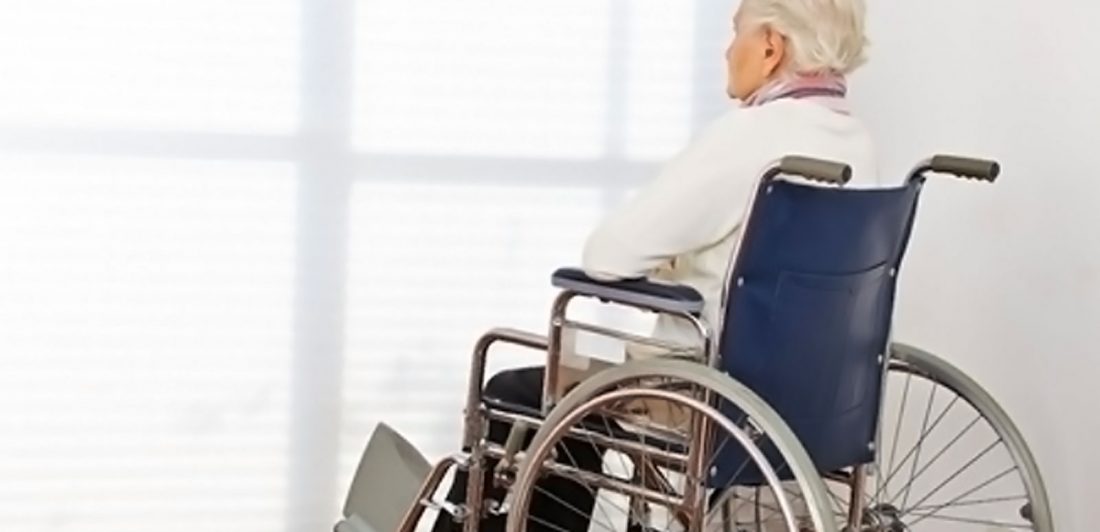 Image of elderly woman in a wheelchair