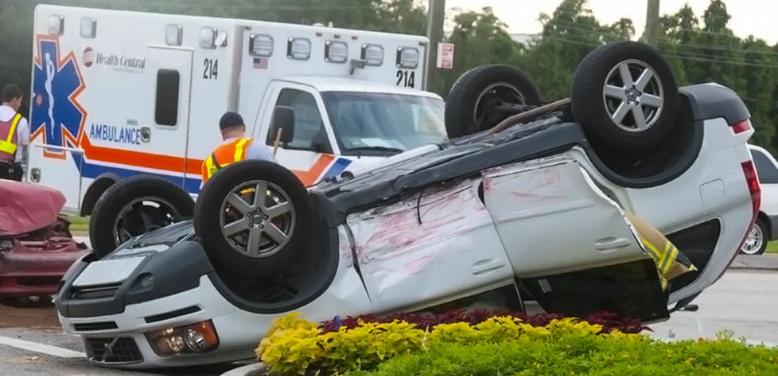 Image of rollover collision with ambulance and paramedics