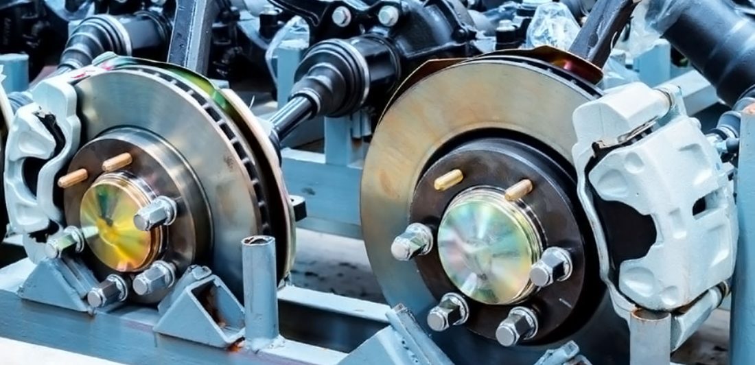 Image of vehicle brake components on assembly line